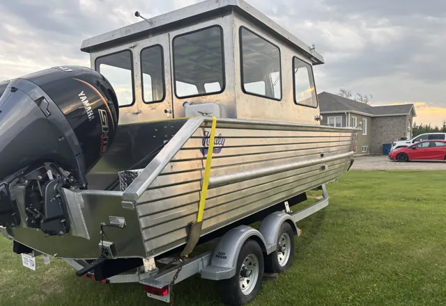 Bow ramp for loading over a beach