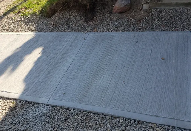 Broom-finish concrete pad — 2022